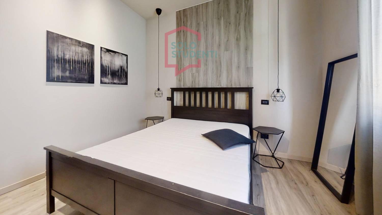 https://img.idia-cdn.it/images/wm/1759/50381/__IAAS1zU__Via-Passo-Buole-5-1P-Bedroom_2.jpg
