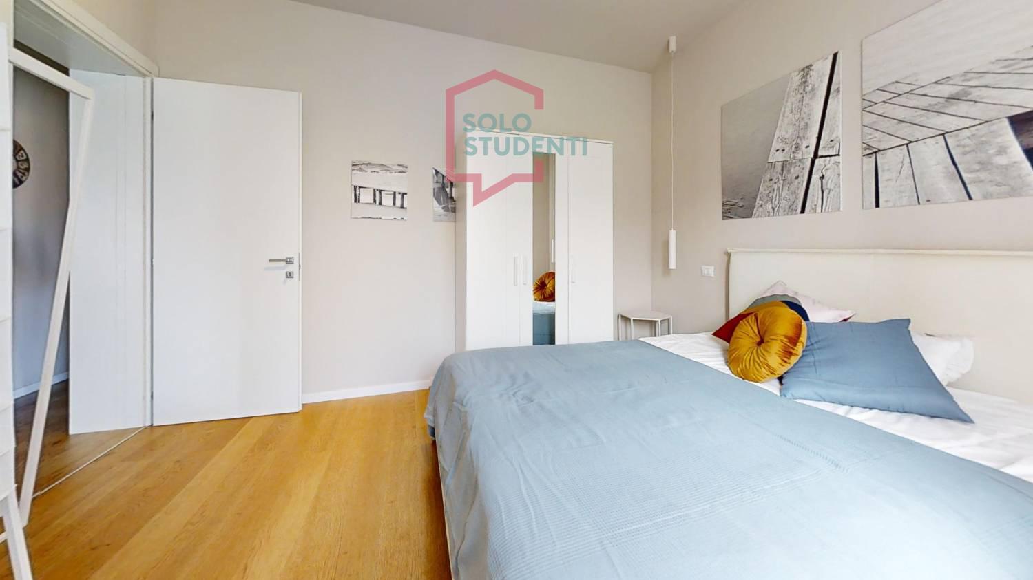 https://img.idia-cdn.it/images/wm/1759/50395/__IAAS1zU__Via-Passo-buole-5-2-Piano-Bedroom.jpg