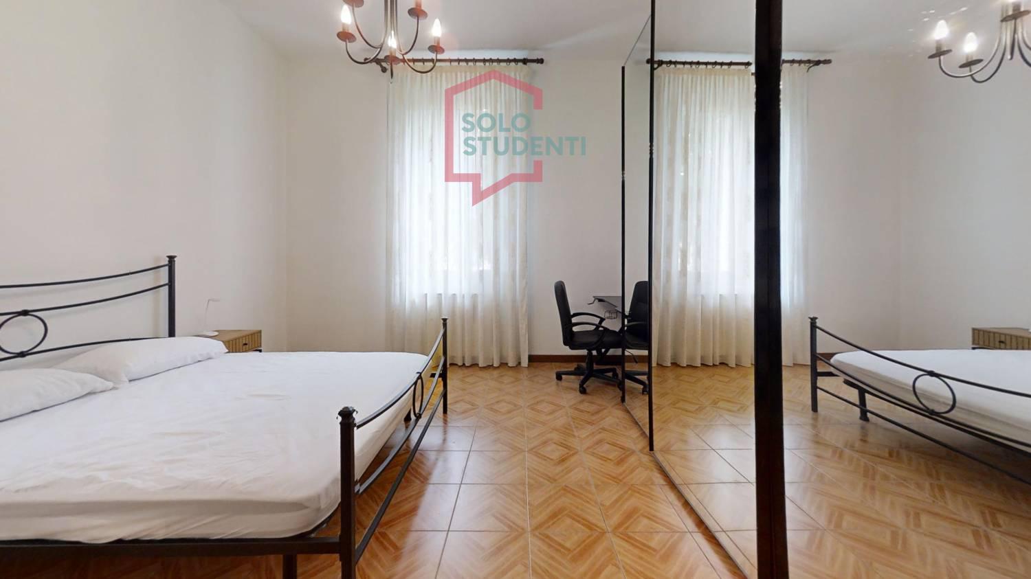 https://img.idia-cdn.it/images/wm/1759/50446/__IAAS1zU__Via-Ariosto-23-Bedroom_1.jpg