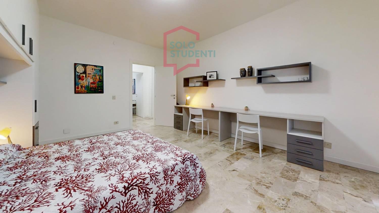 https://img.idia-cdn.it/images/wm/1759/51619/__IAAS1zU__Via-Trento-21-2-Piano-Bedroom_1.jpg